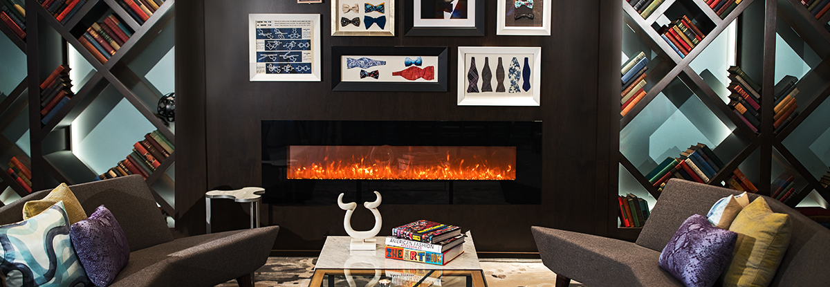 A sleek lobby space with a modern fireplace.