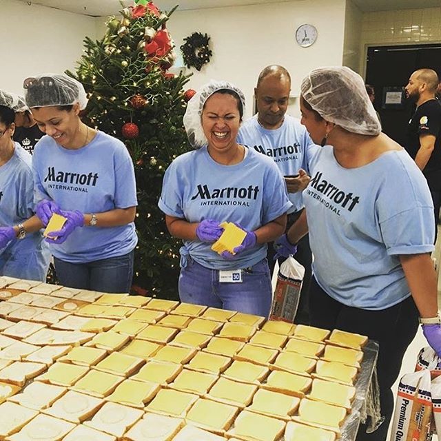 The joy of #GivingBack.  @MarriottIntl associates bonding while preparing more than 20k meals for Puerto Ricans in need. @wckitchen