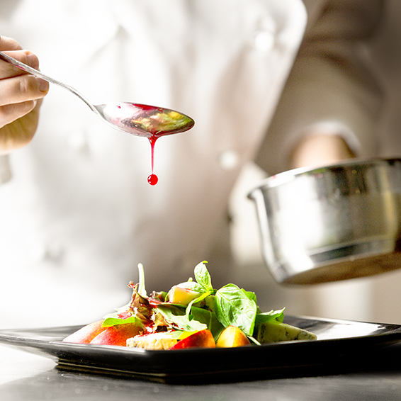 A chef preparing a delicious feast at the Ritz-Carlton.