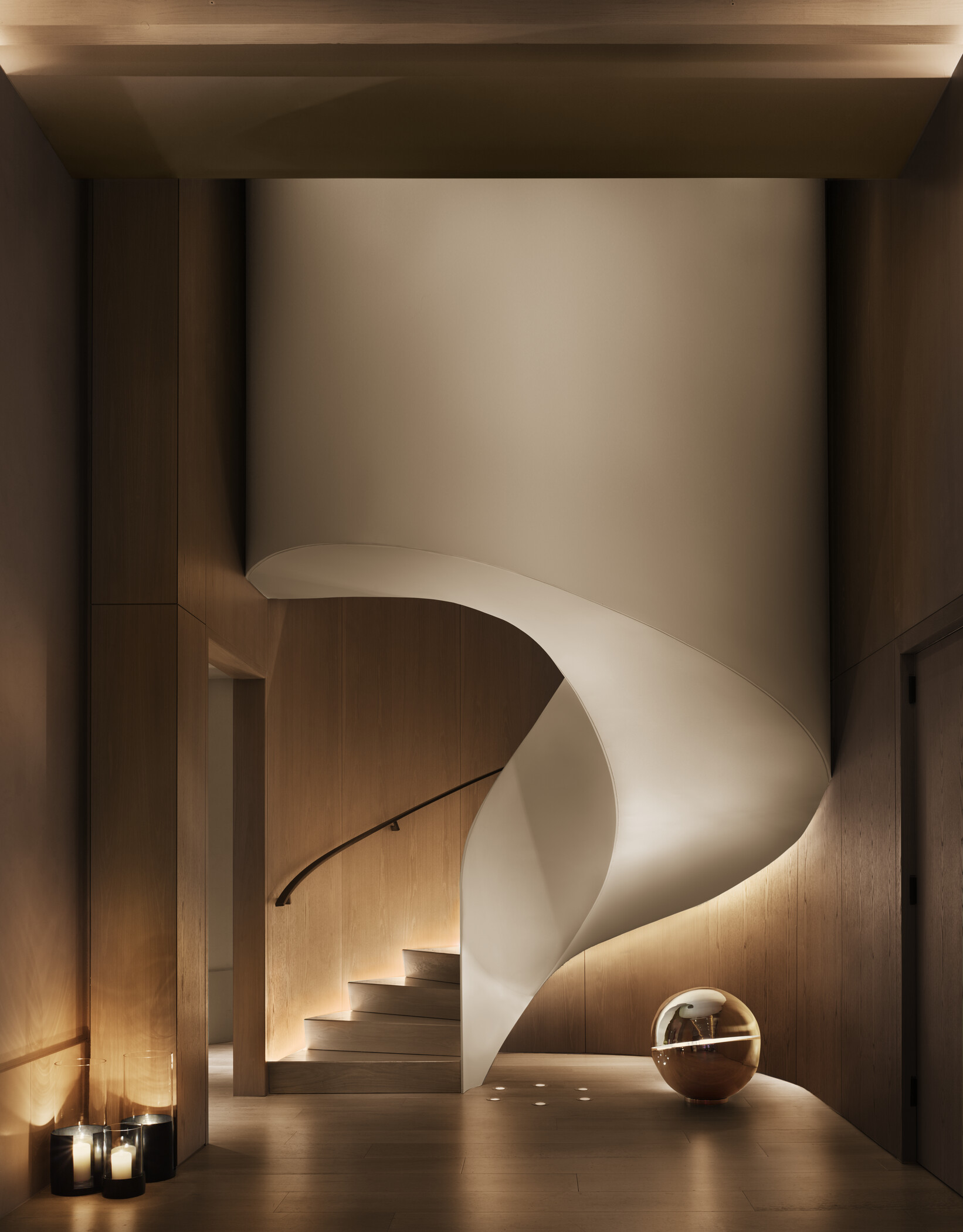 Central staircase with accent lighting