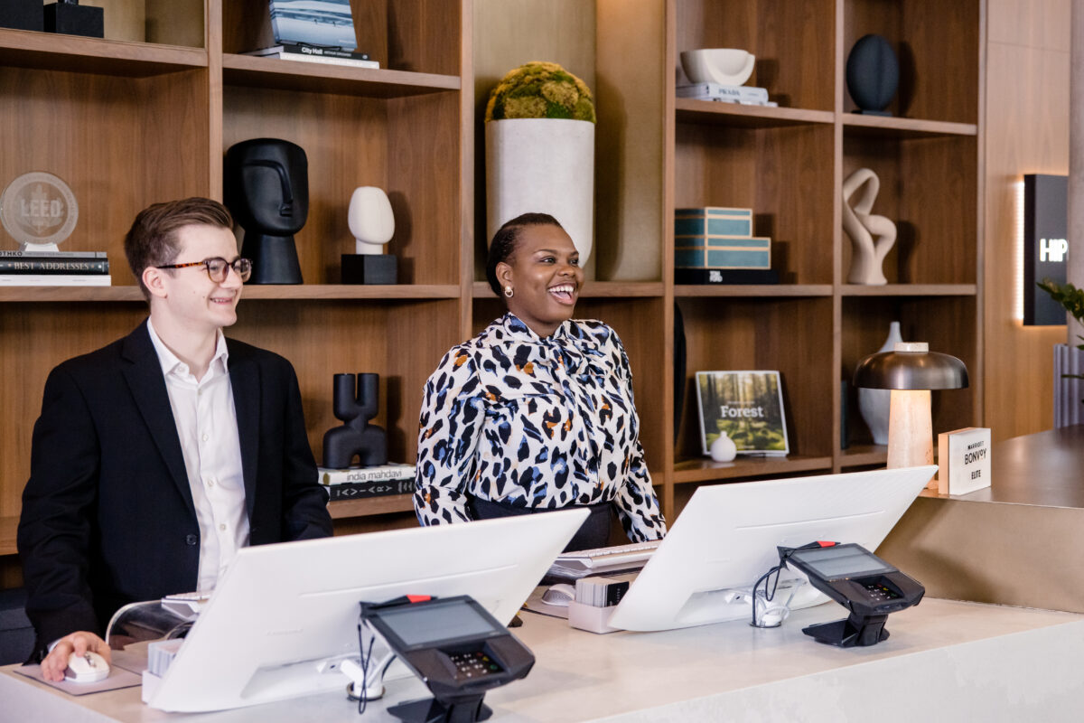 two marriott associates at the front desk